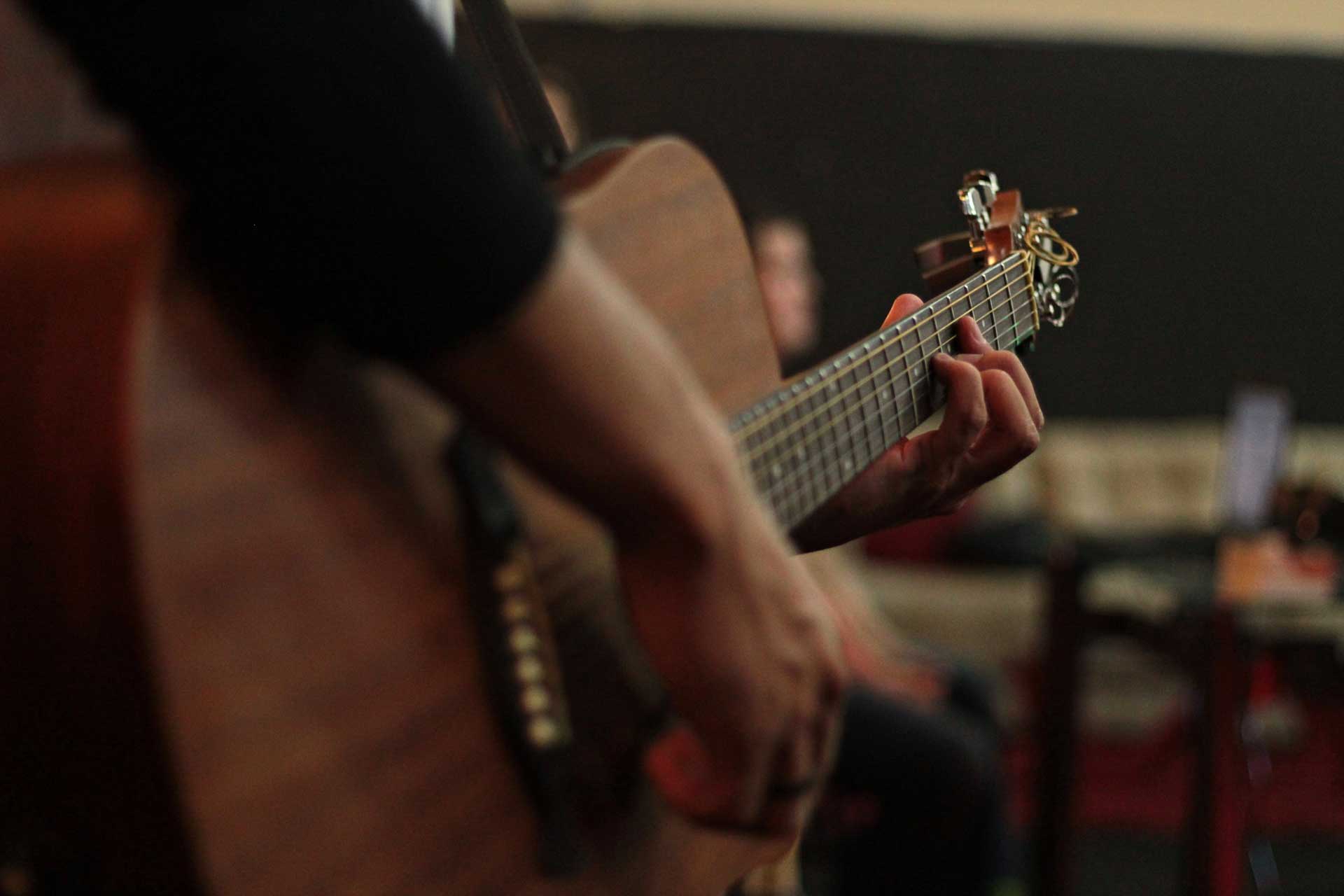 Guitar Player on Porch